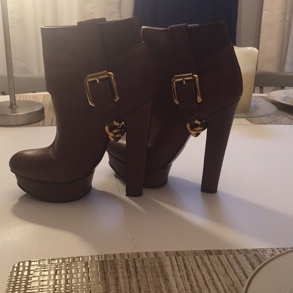 Brown high heeled boots